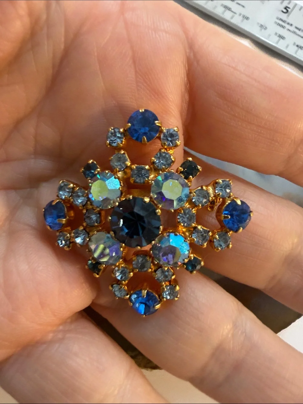 Vintage Star Brand Austrian stones Gold-Tone Blue Crystal Floral Brooch Guc 1.5”